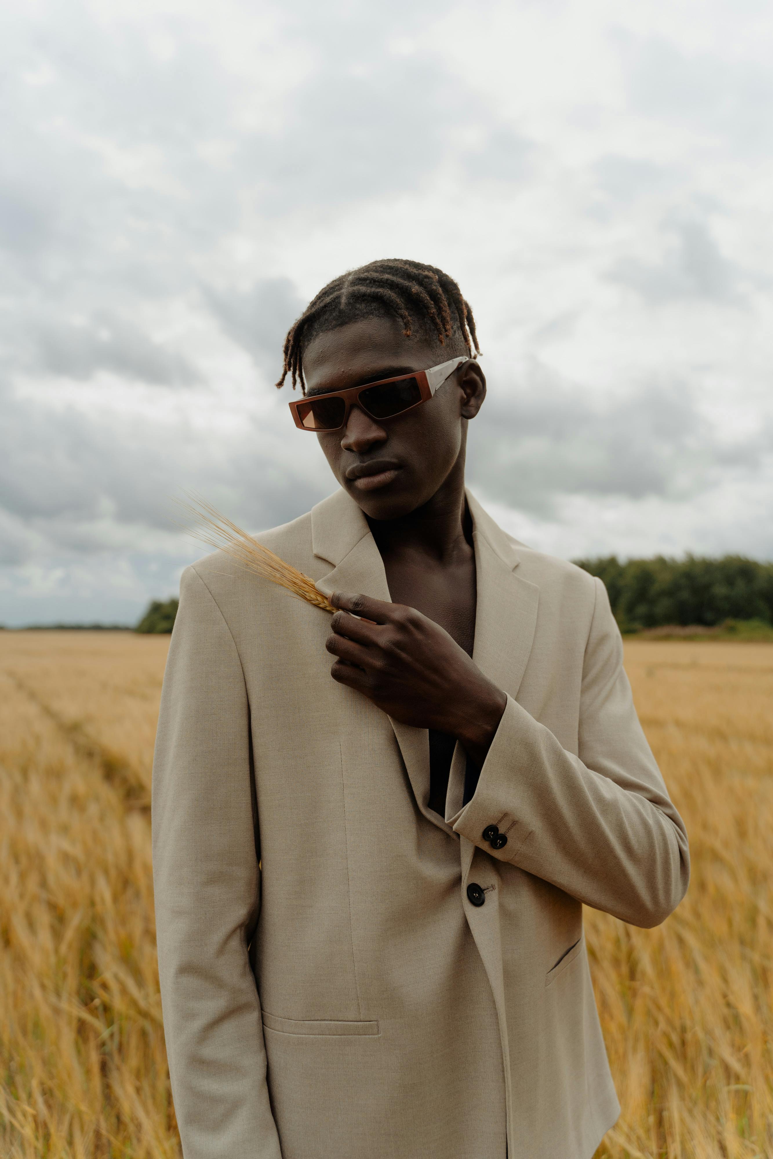 Man holding an ear of wheat in his hands