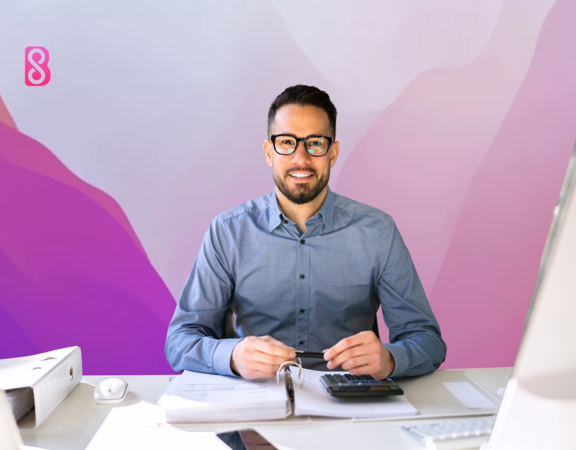 A Chartered Accountant (CA) sitting on his work desk