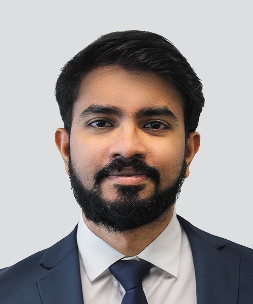 A portrait of a young man smiling