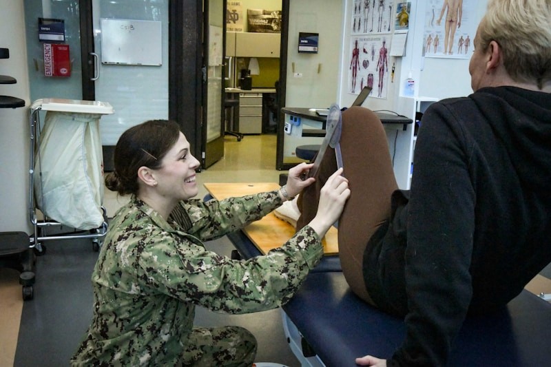 Orthopedic clinician examining a patient’s leg