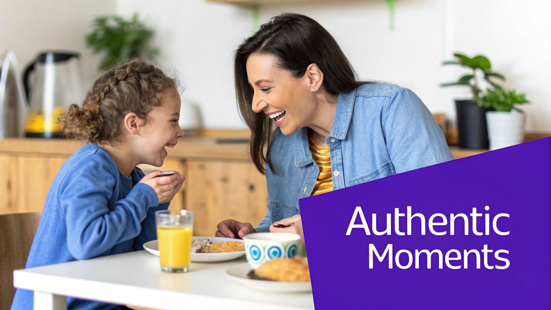 A happy mother and daughter share a joyful breakfast moment, laughing together at the table.