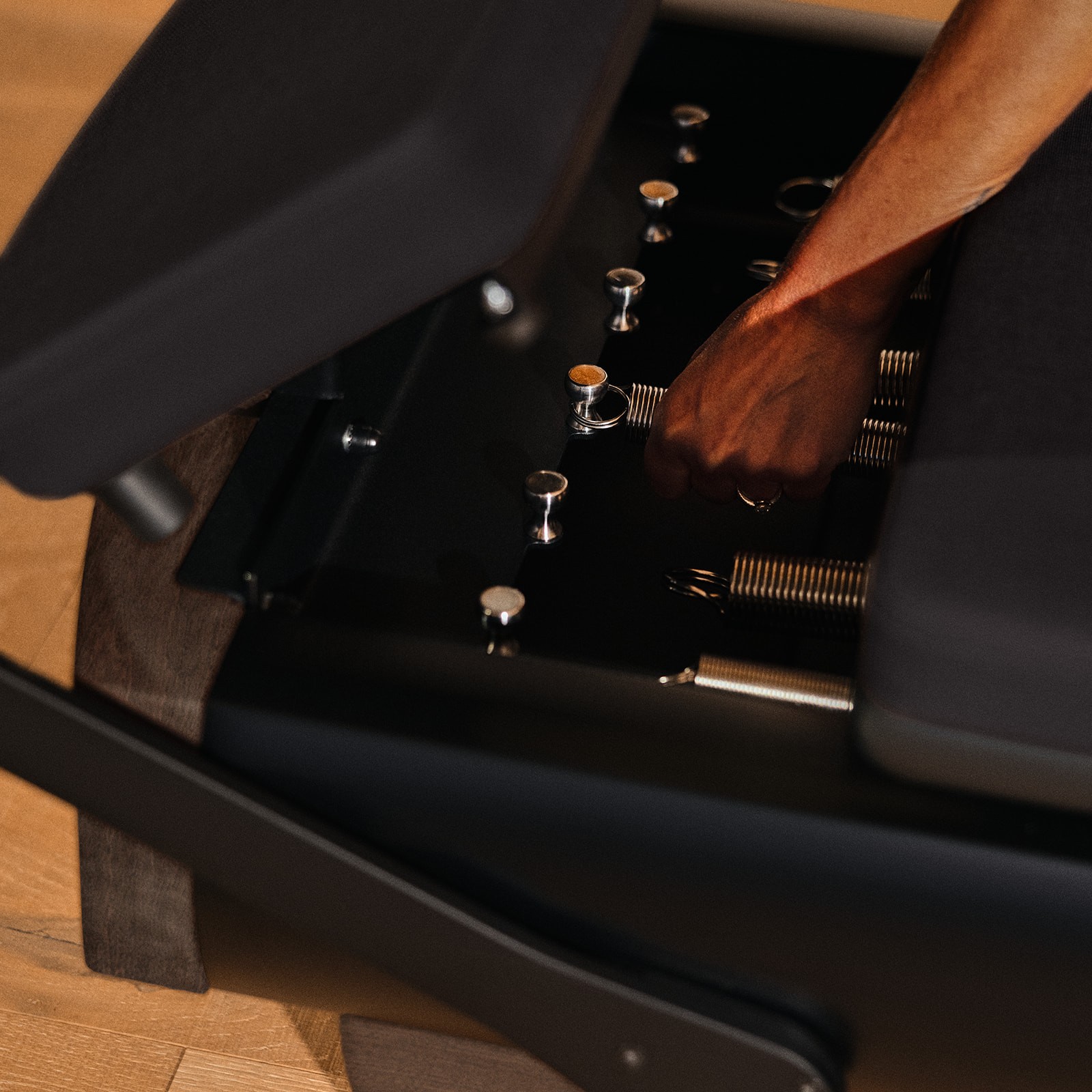 Kitchen and dining area with wooden cabinets and table.