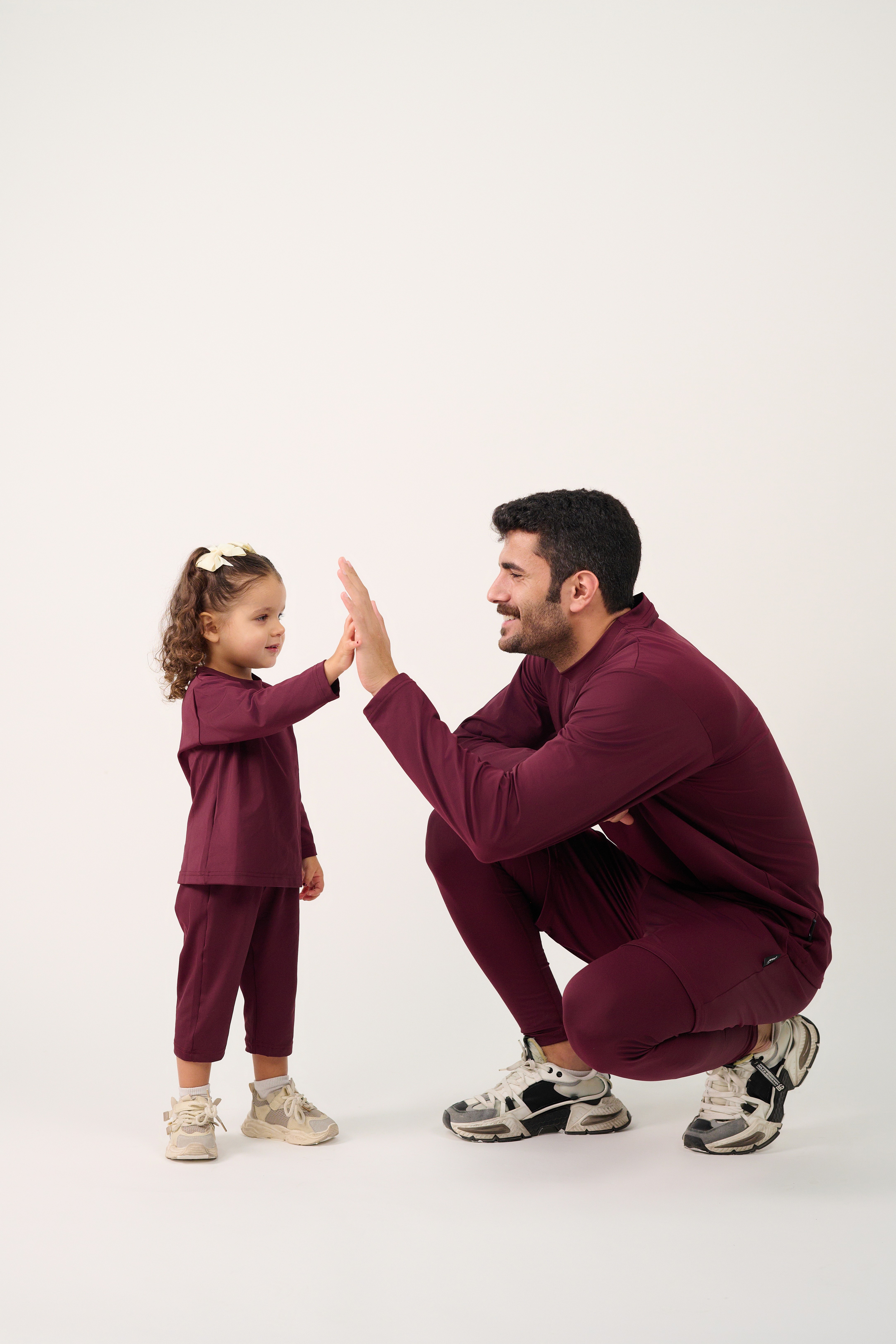 Friends laughing and posing inside a car