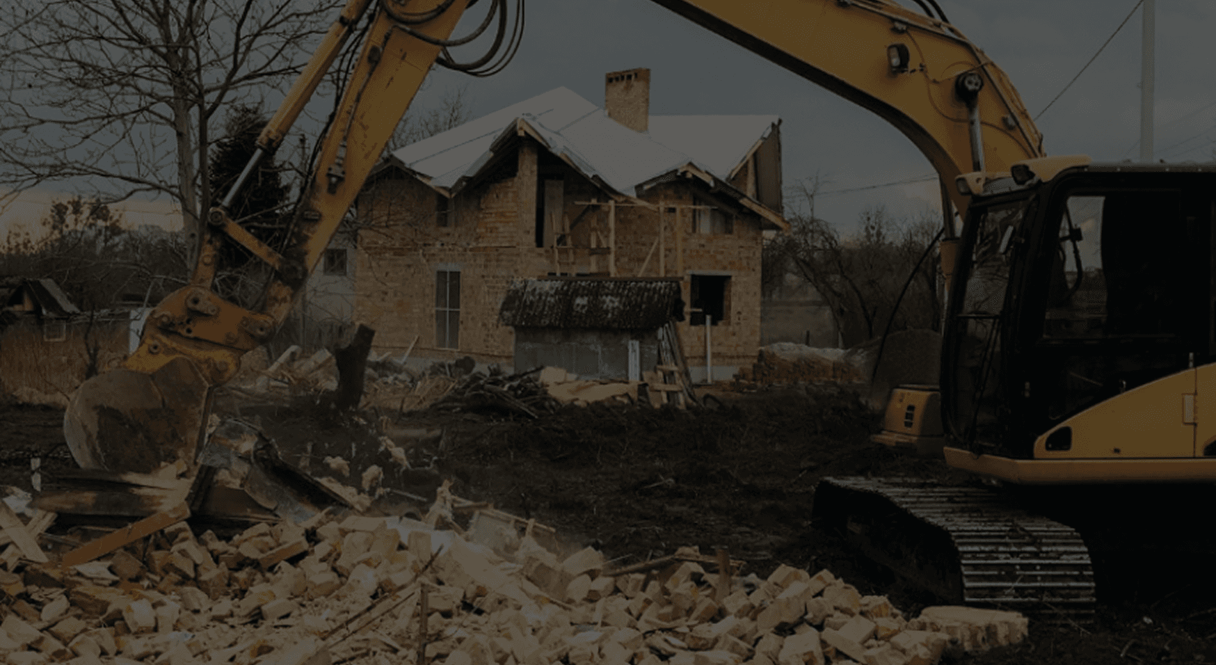 house and land demo with excavator