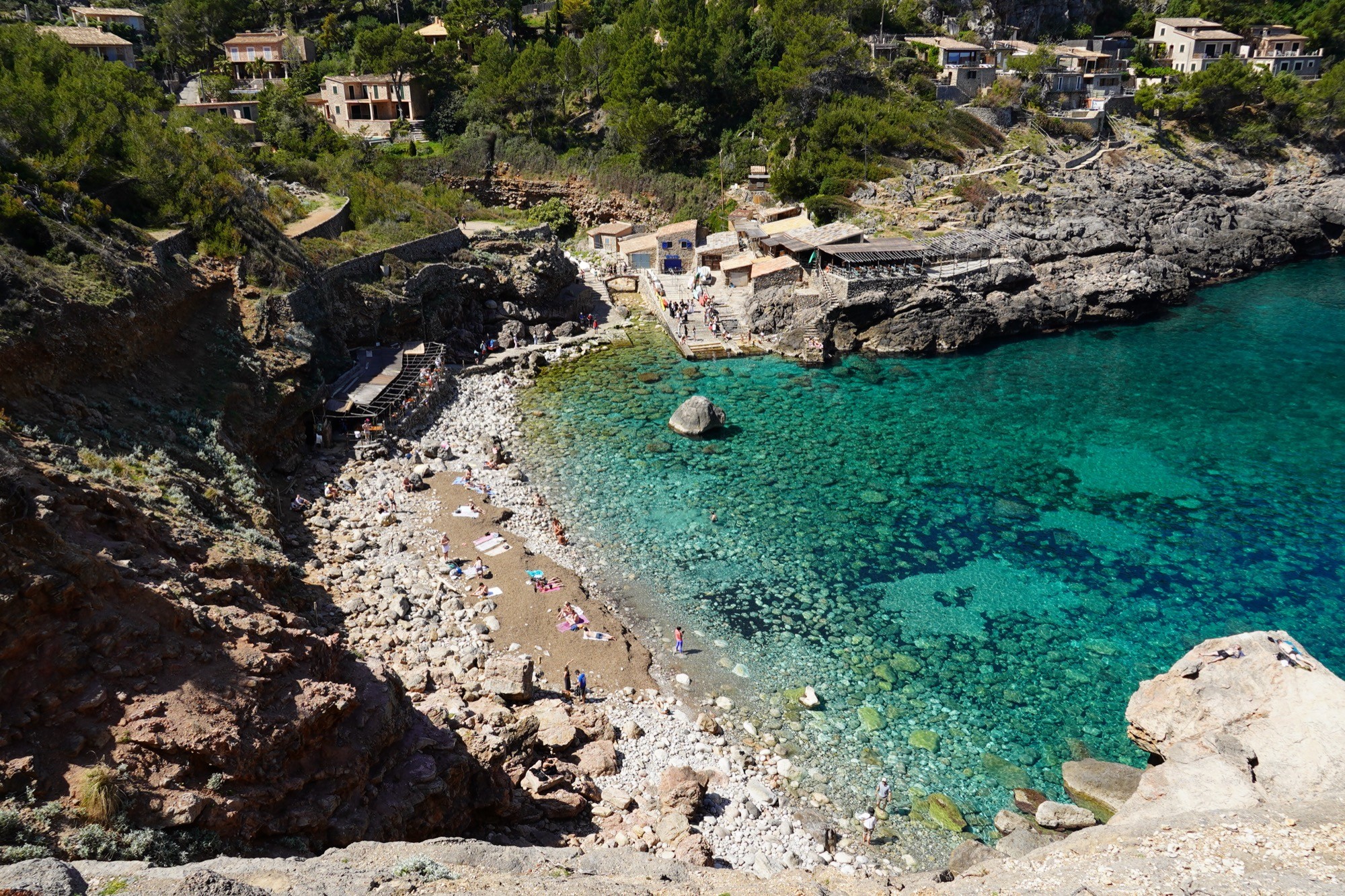 Cala Deià, between cliffs on the north coast of Mallorca