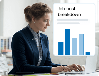 Businesswoman reviewing laptop charts with a digital overlay showing a “Job cost breakdown” graph, symbolising spend tracking and cost control.