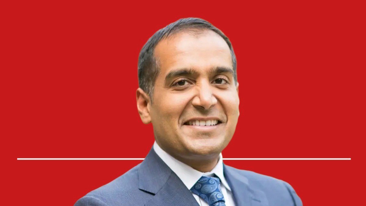 Image of Sachin Jain on a red background for the Value Health Voices Podcast