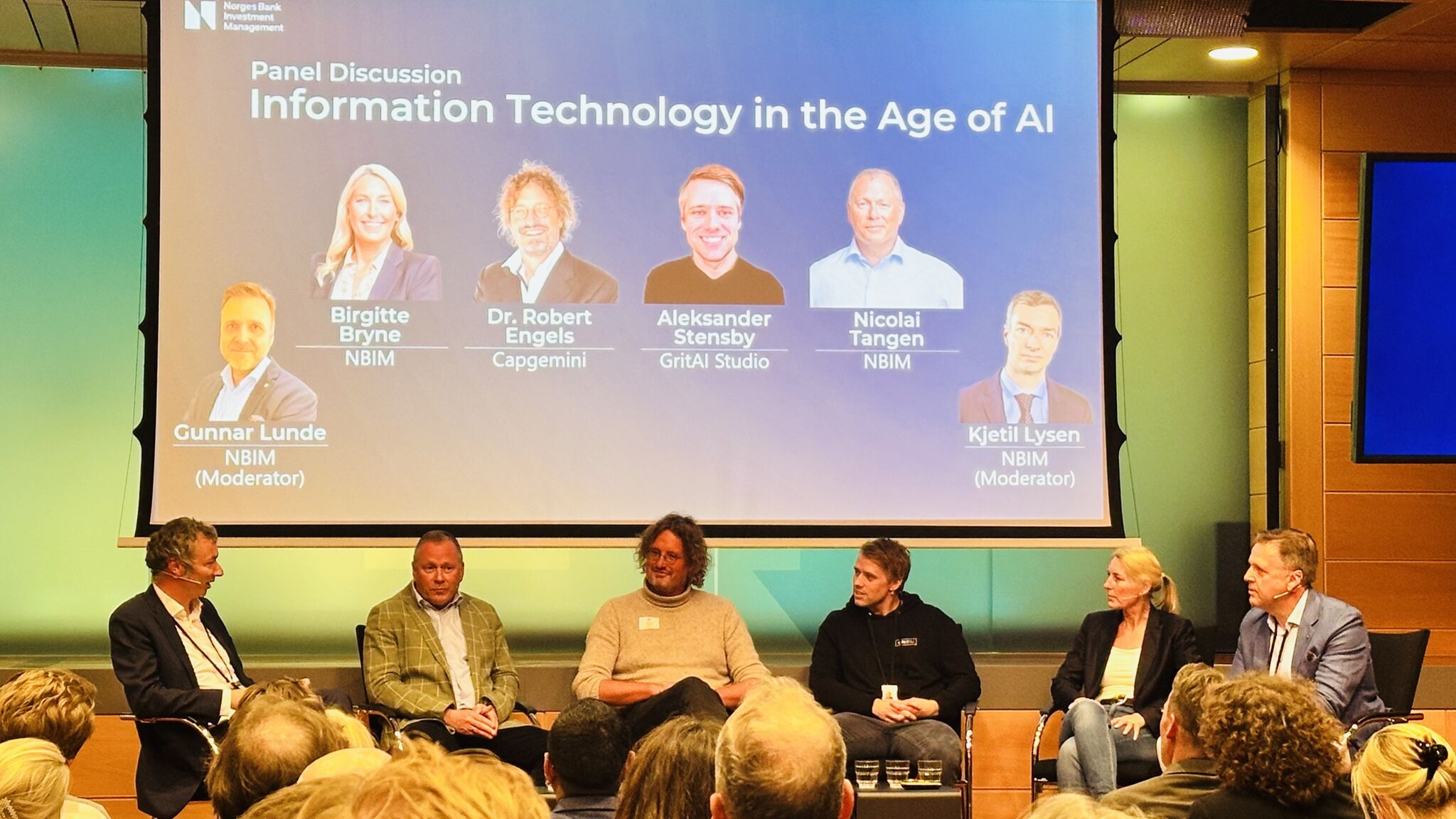 Aleksander at tech nights on stage with Nicolai Tangen, Birgitte Bryne, and Dr. Robert Engels.
