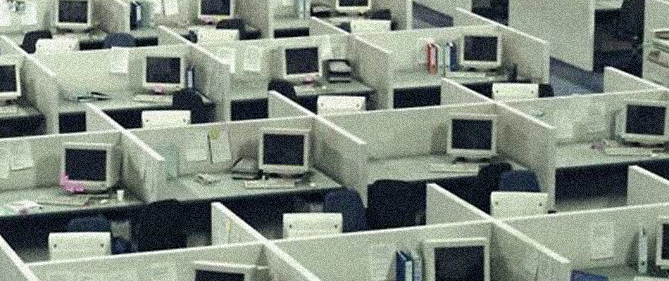 people sitting on chair in front of laptop computers