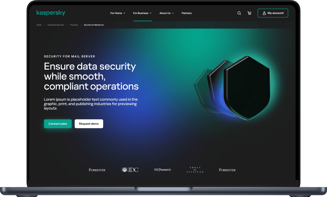 Laptop showing Kaspersky Enterprise home page with a black 3D shield