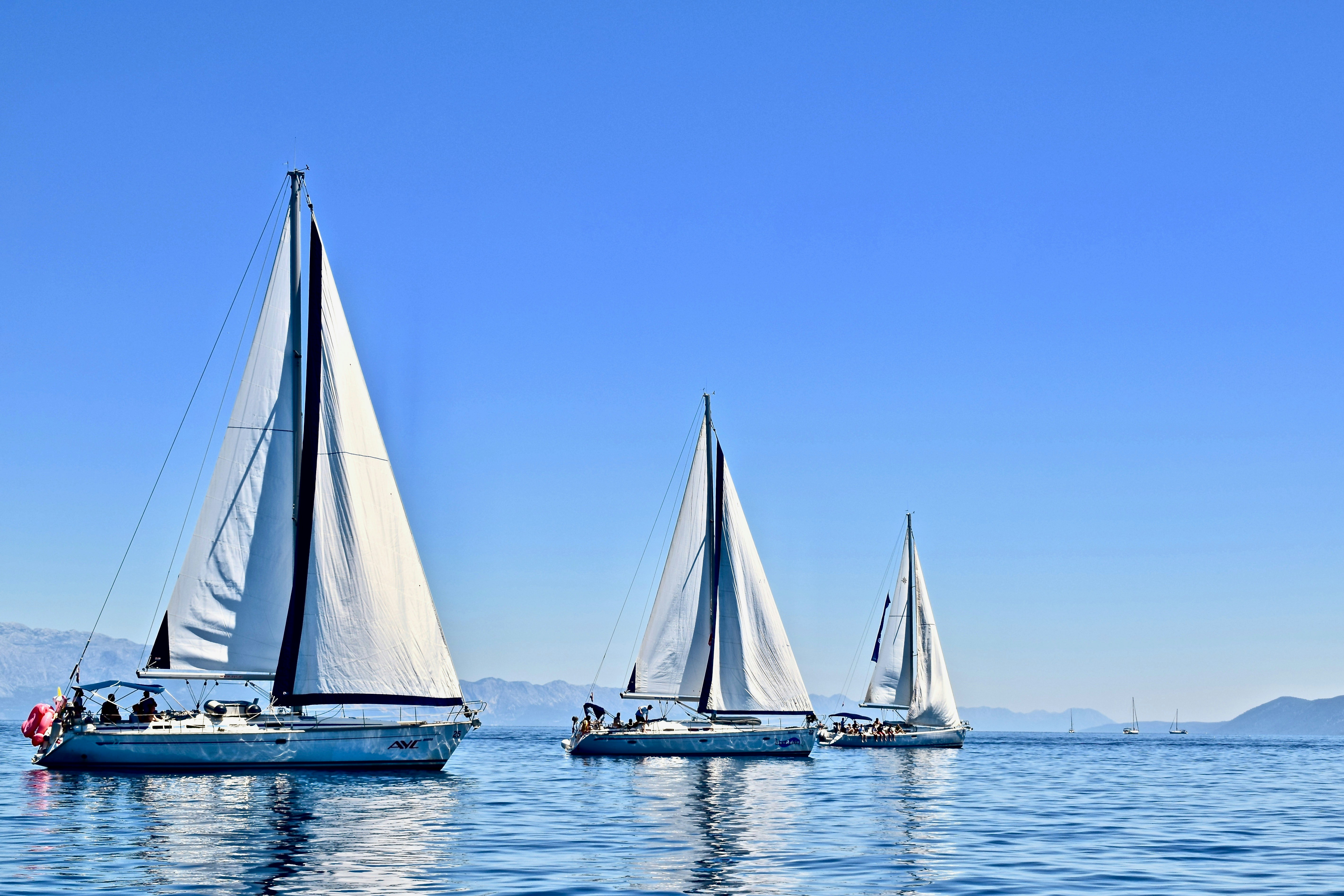 Three sailing boats