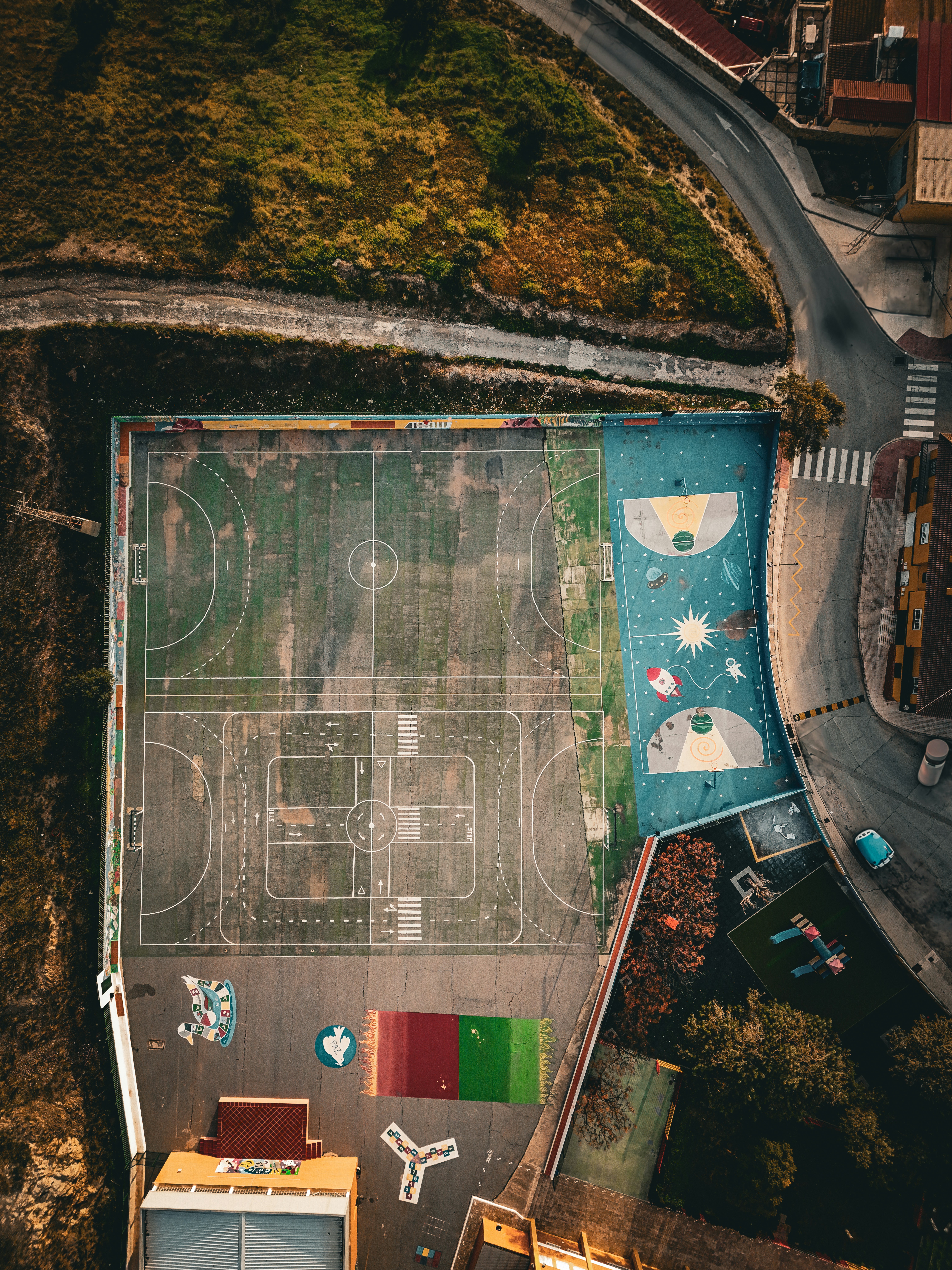 An aerial view of a colorful playground.