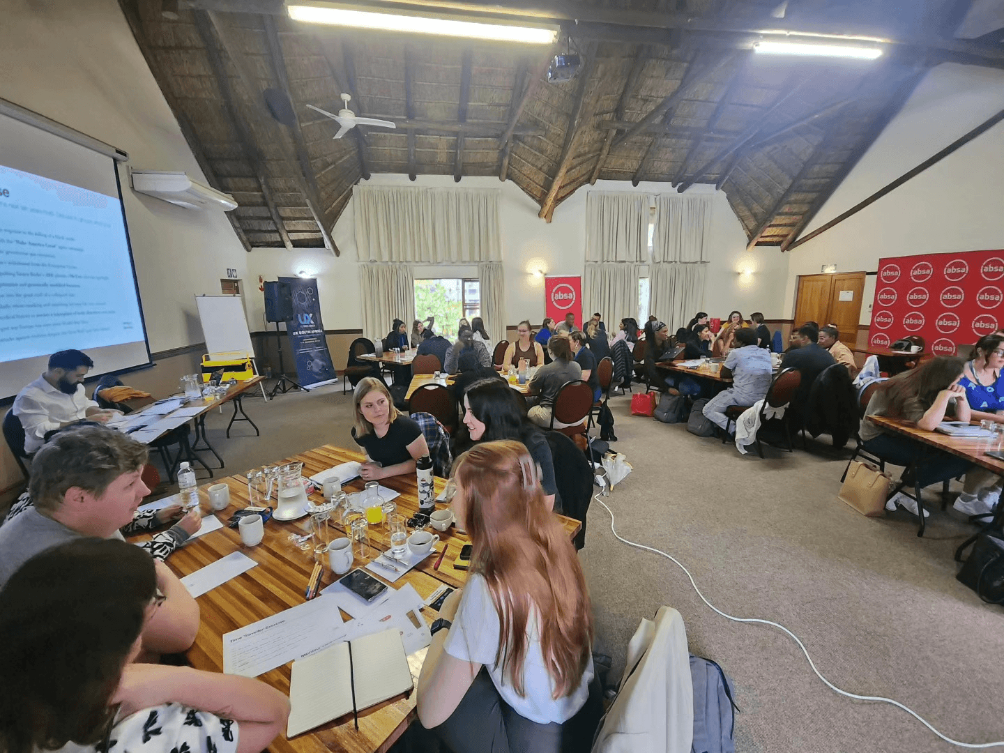 Young Men Looking at the Laptop Screen and Smiling