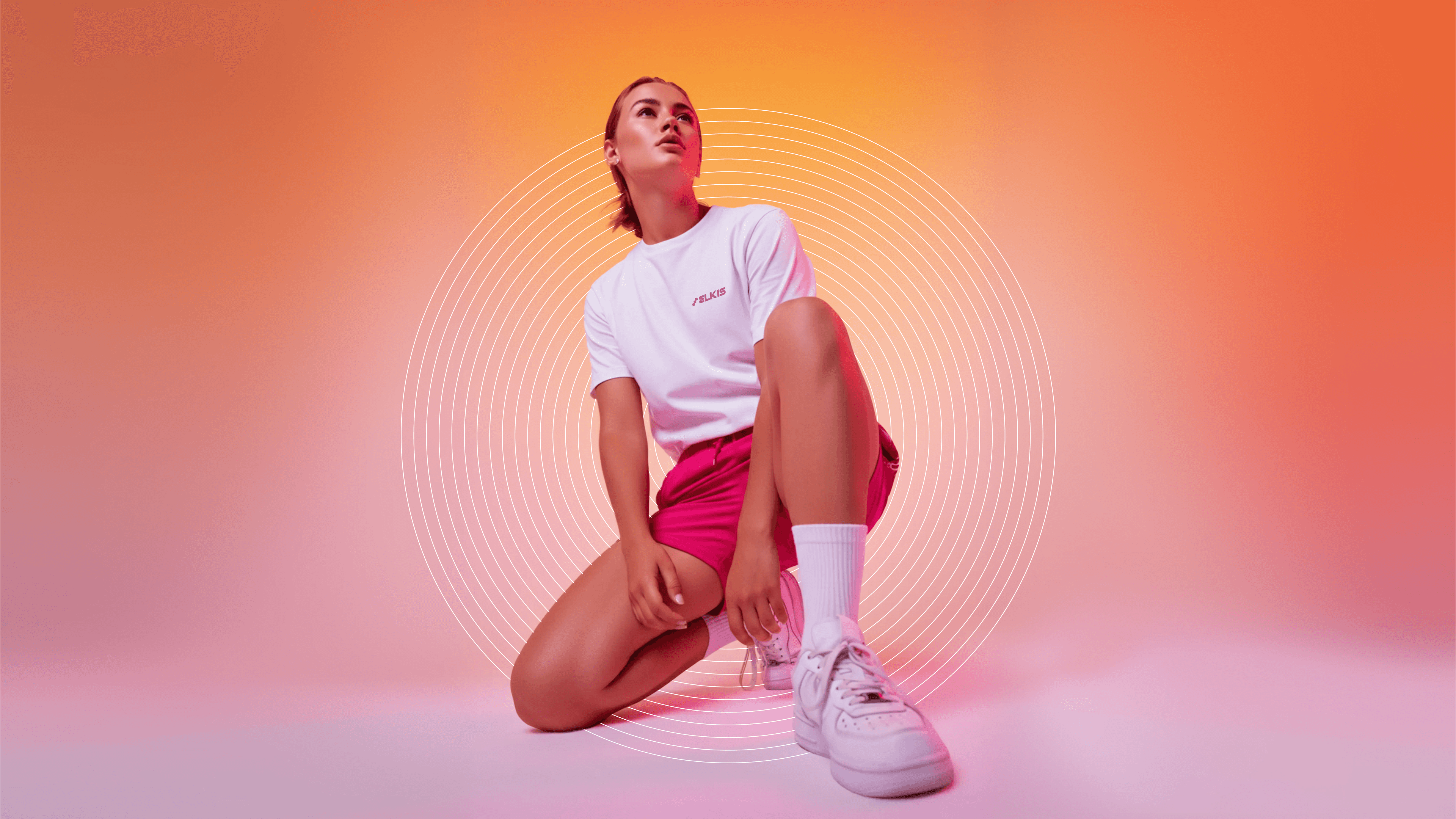 silhouette of man jumping on rocky mountain during sunset