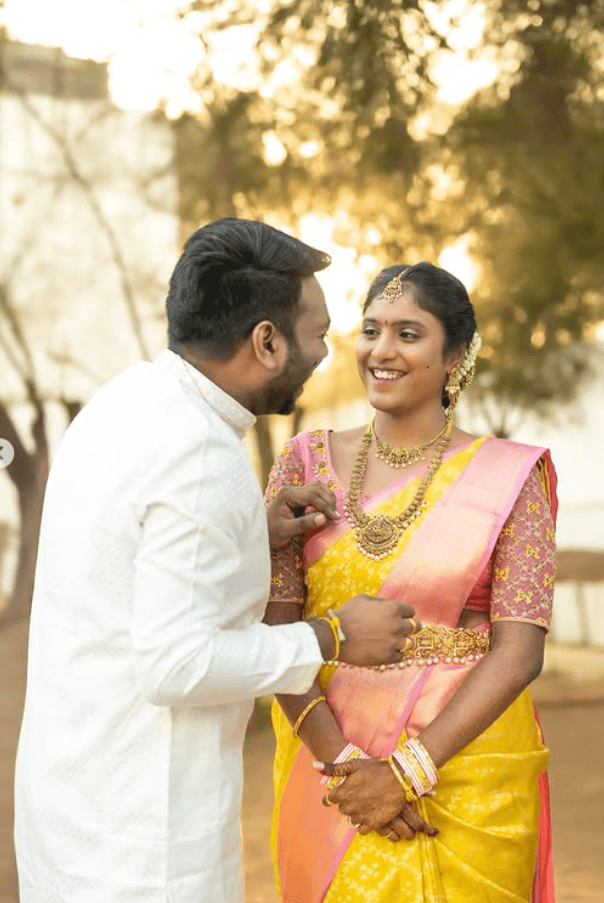 a man and a woman standing next to each other