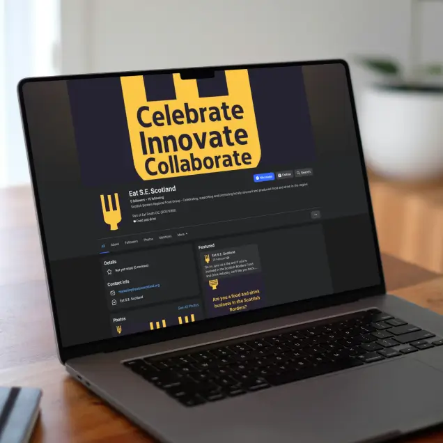 Laptop screen showing a Facebook page titled "Eat S.E. Scotland" with a fork logo. The banner reads "Celebrate, Innovate, Collaborate" in bold yellow text.