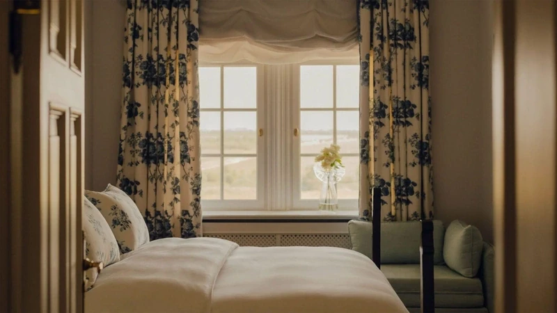 a palace bedroom with a large continental bed