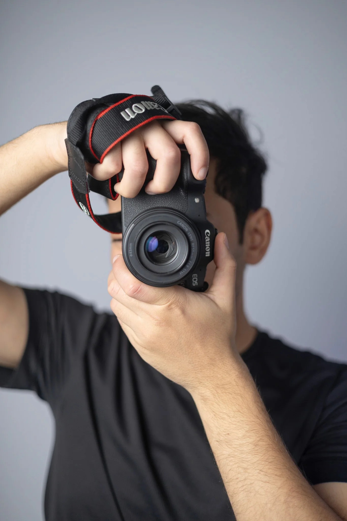 Photographer holding a camera