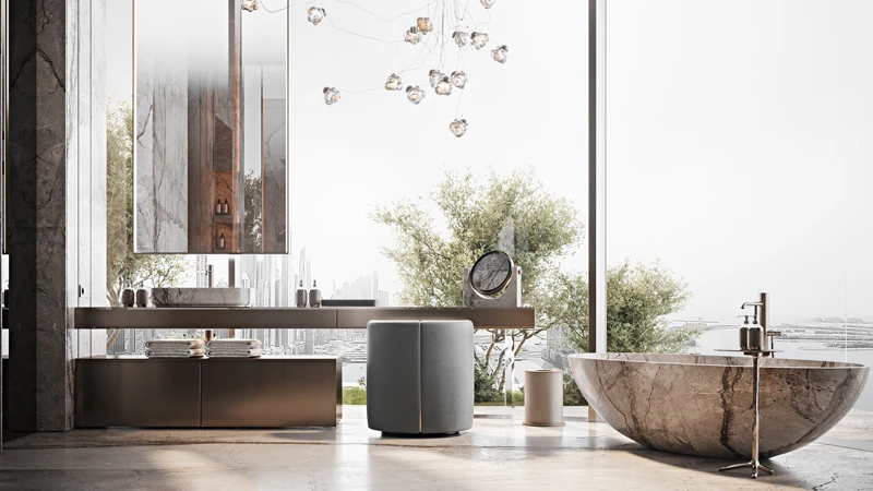 Ultra-luxury marble bathroom at Ava by Omniyat featuring a freestanding tub and sea views.