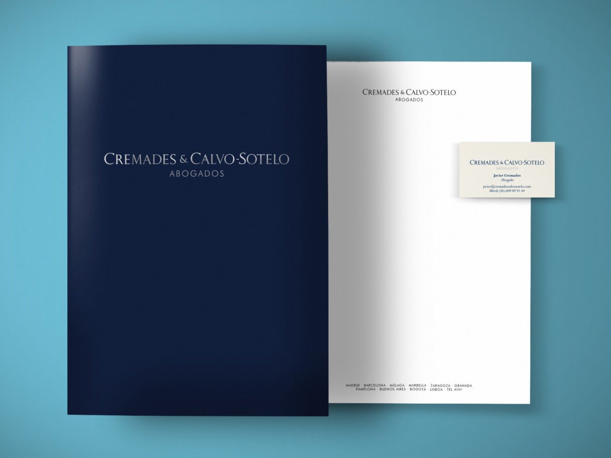 Rooftops of a coastal town with the sea in background