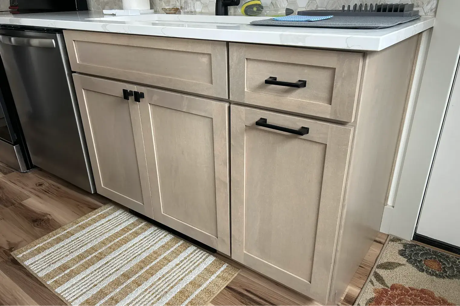 Light wooden cabinet with drawers and countertop
