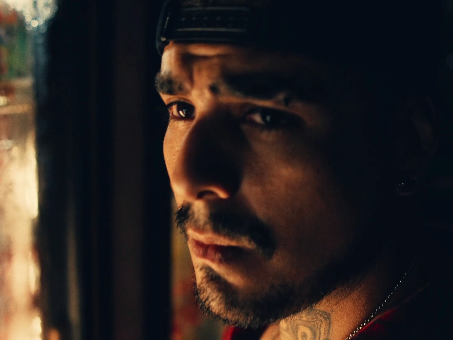 Raw, honest performance shot of Santa Fe Klan in "Perro Lobo," prioritizing emotion over technique to create a cinematic piece with deep social impact