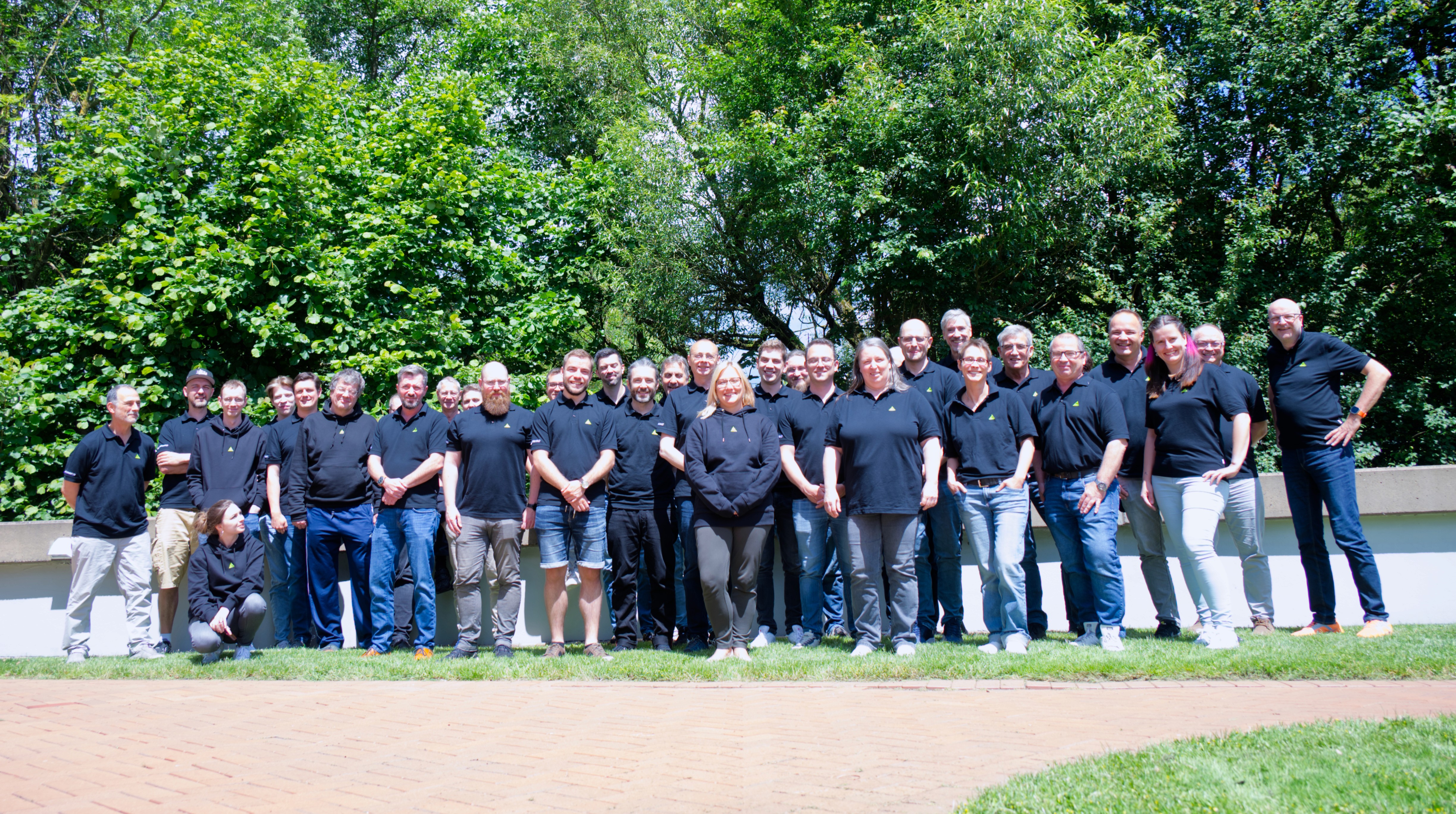 people sitting on chair in front of laptop computers