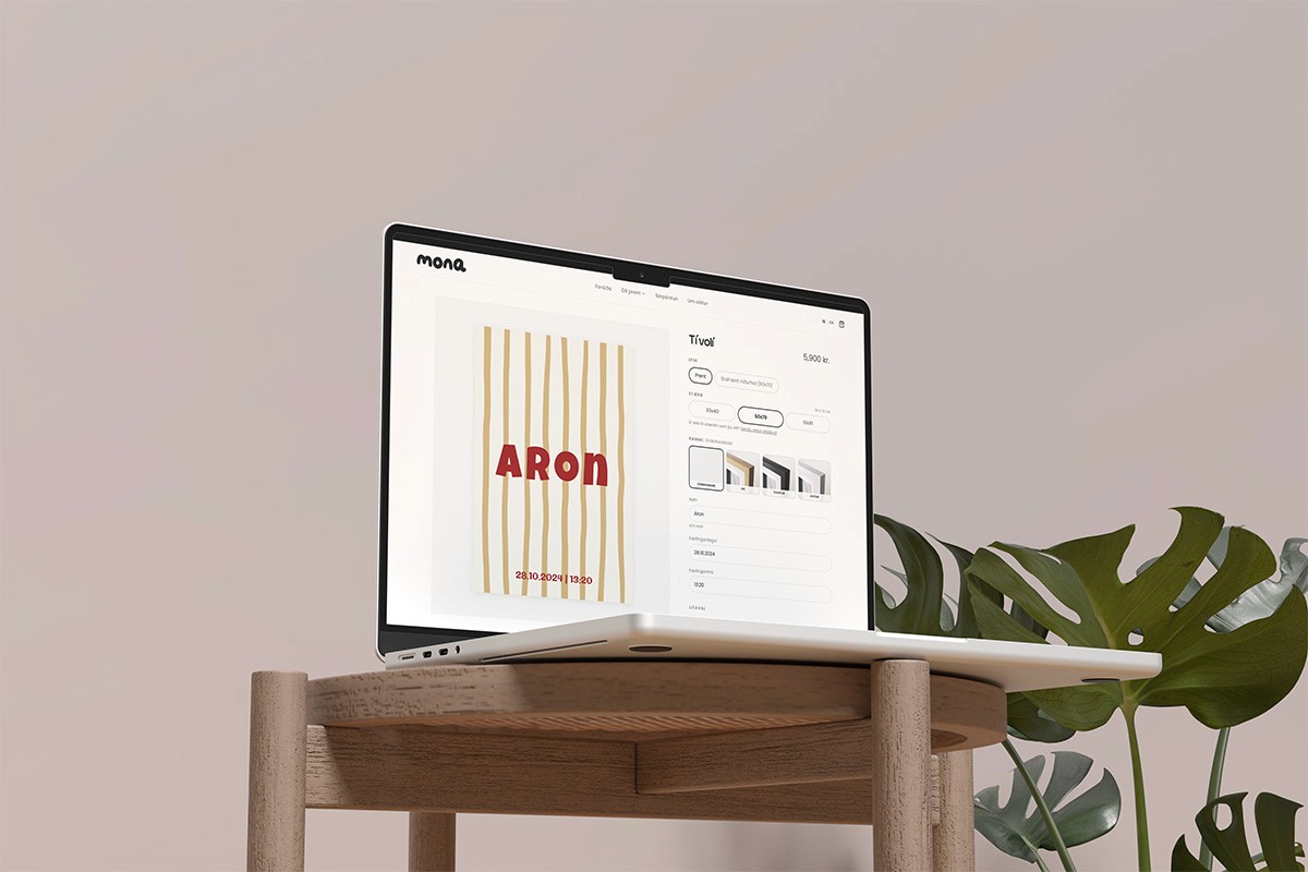 A neatly arranged set of gray office supplies on a gray surface, featuring notepads, a smartphone, pens, and a colorful gradient book cover, conveying a sleek, modern vibe.