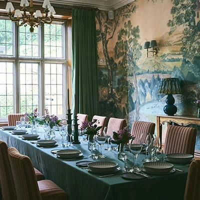 Dining room view of green room with set table for hartingtons heritage tour meal