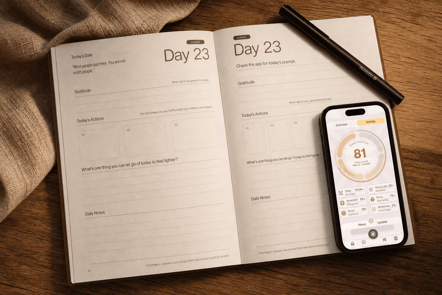 An open One Story journal beside the app