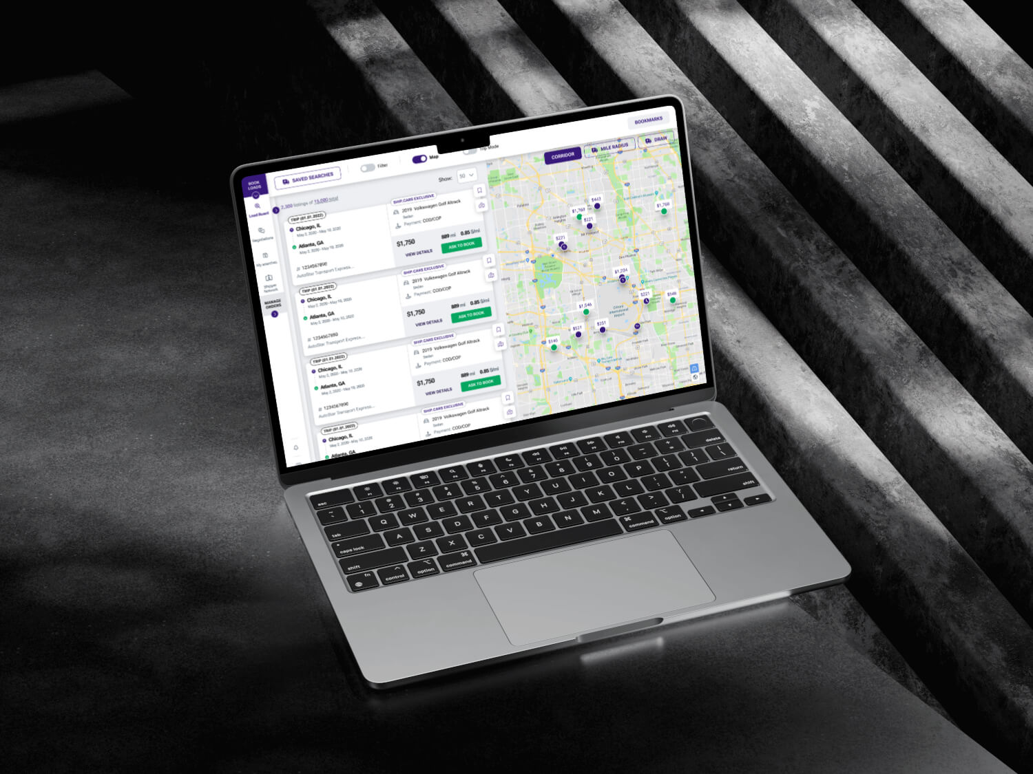 Laptop displaying Ship.Cars logistics dashboard with load list, pricing details, and map view showing active routes and vehicle locations