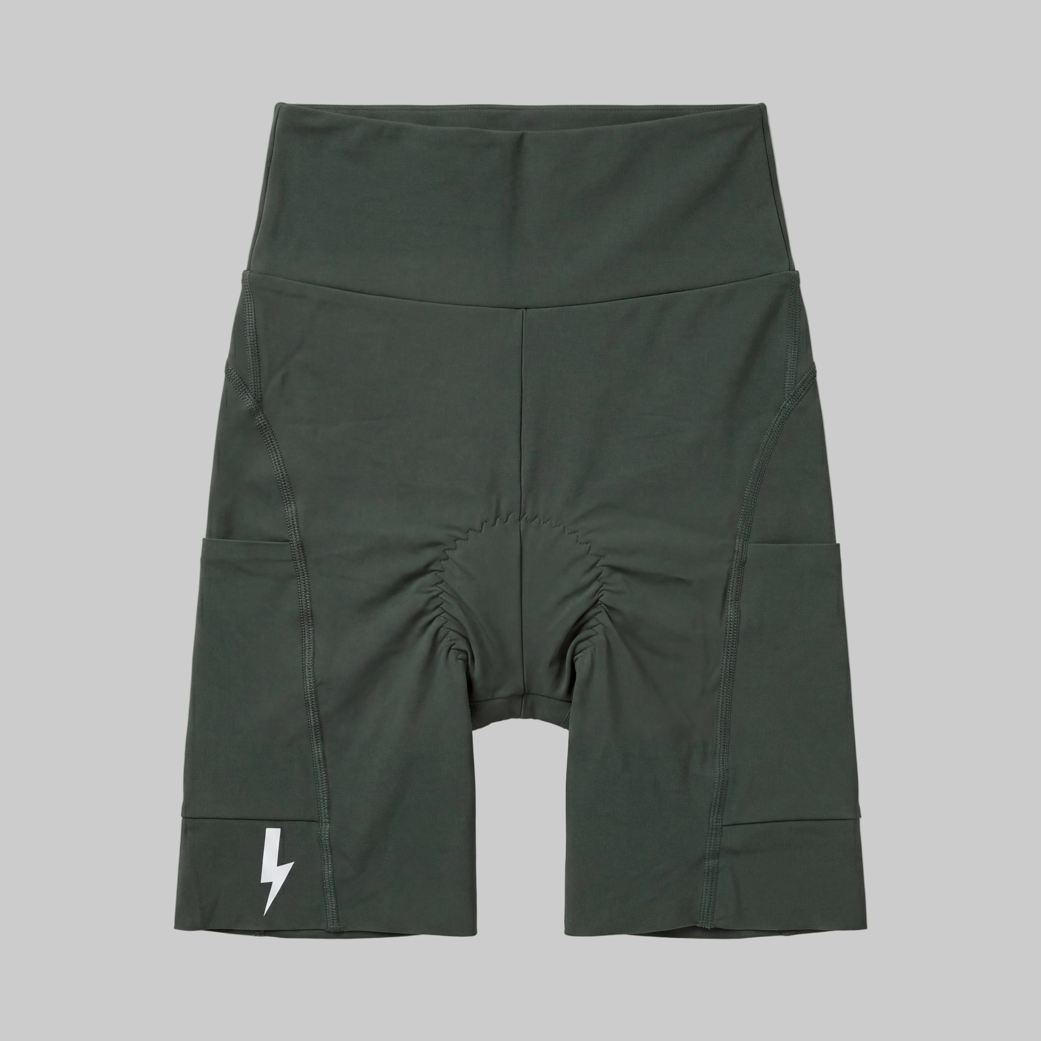LUCA Empower women's high-waisted cycling shorts in basil, front flat lay