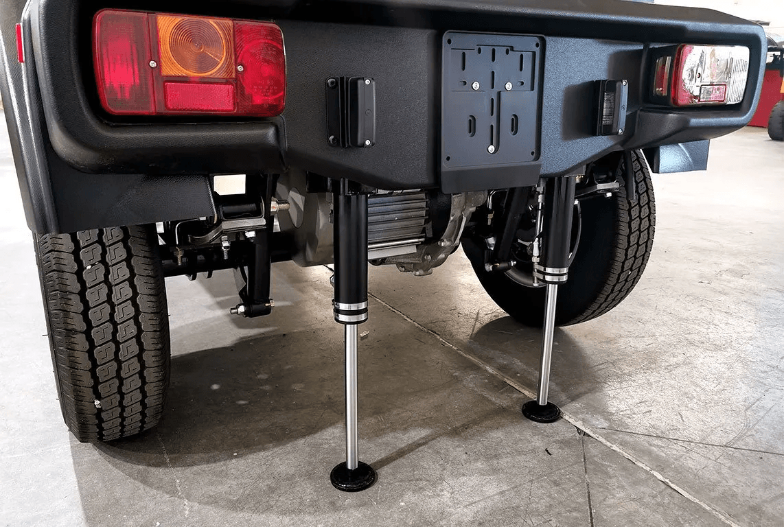 A boat tows a float on the water.