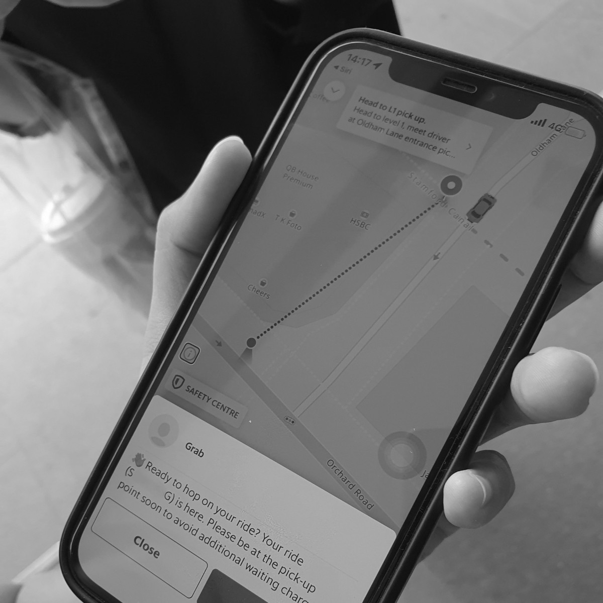 A black and white screenshot of the Grab app