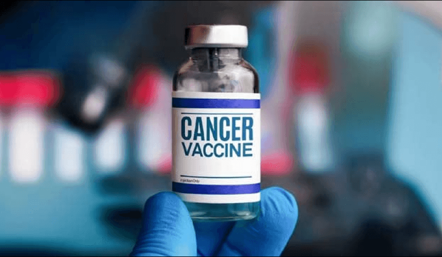 Close-up of a vial labeled 'Cancer Vaccine' held by a gloved hand, symbolizing advancements in cancer treatment and vaccine development. Russian Healthcare Innovations, mRNA Cancer Vaccines, Global Cancer Research