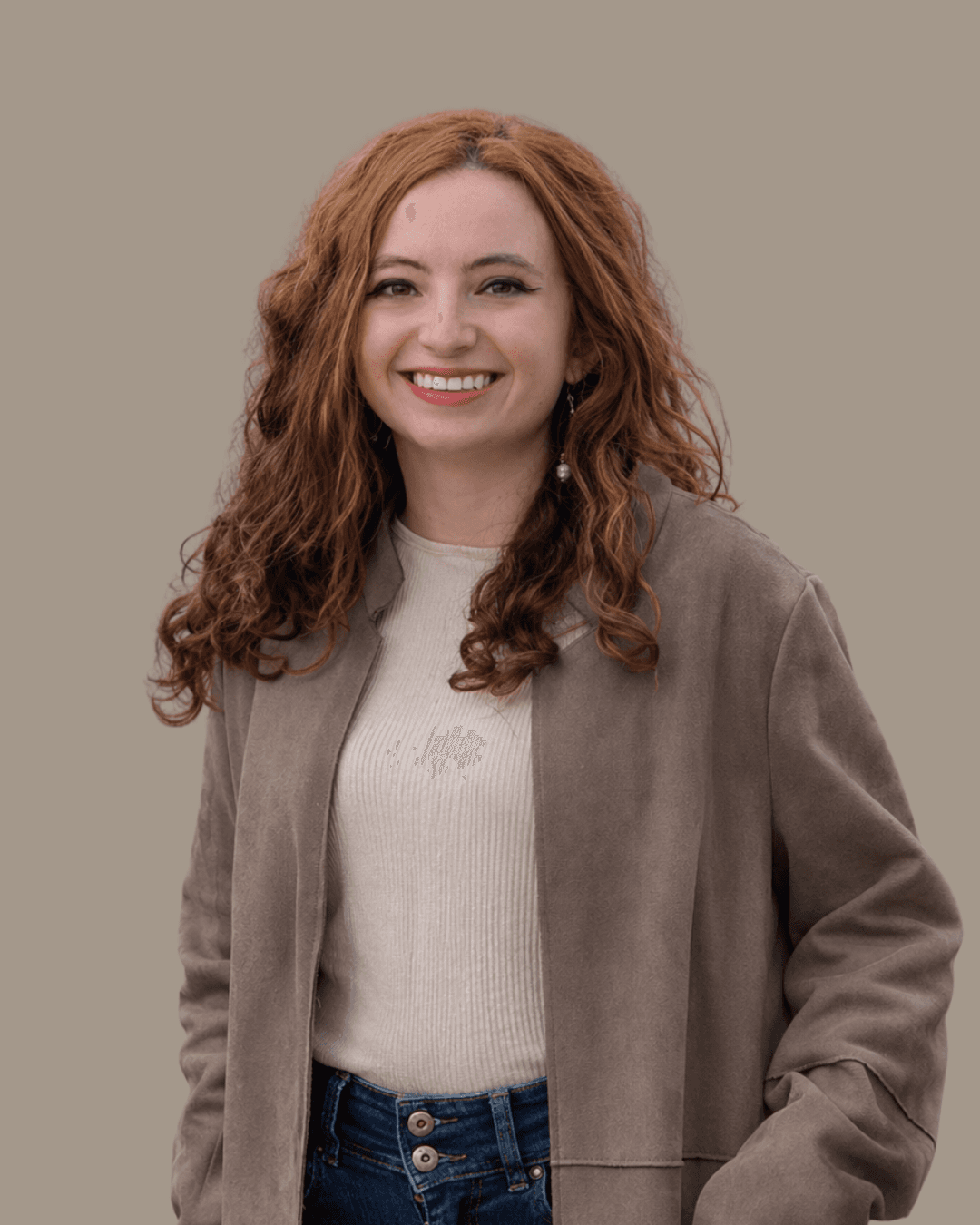 A thoughtful young person with dark hair gazes to the side, captured in soft black and white lighting.
