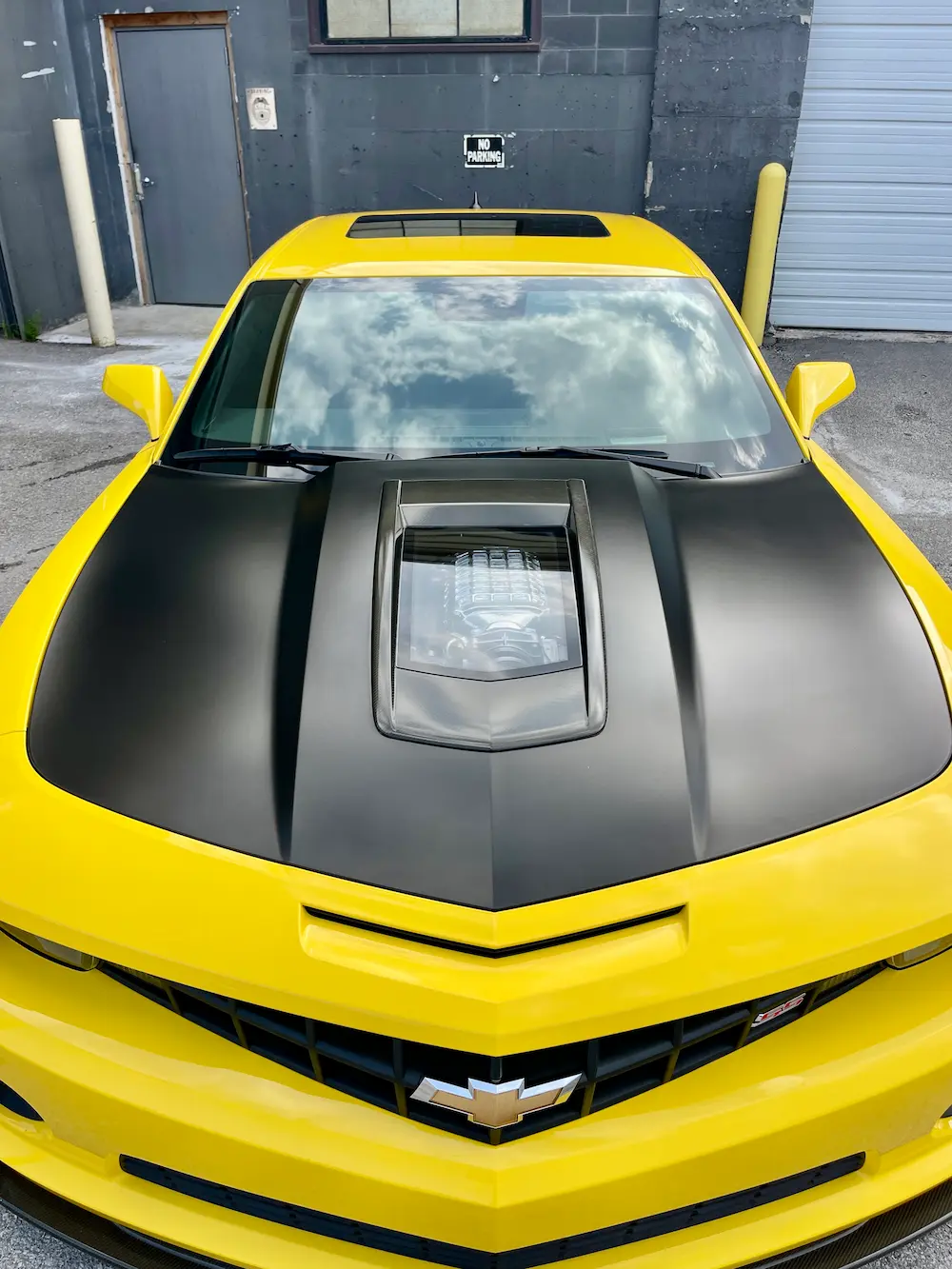 Porsche 911 getting detailed, including paint correction and ceramic coating in kansas city