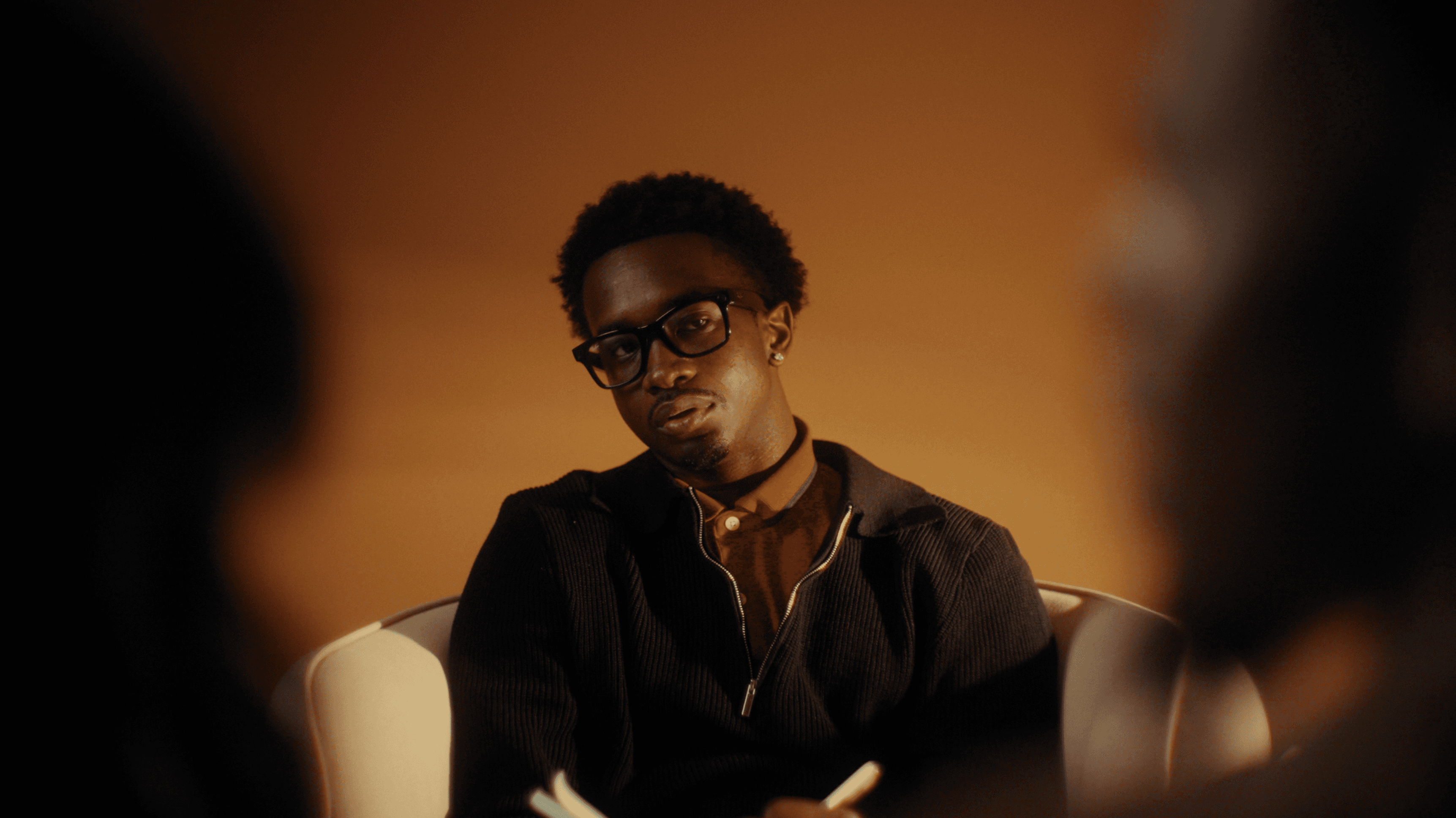 Therapist Looking At Couple