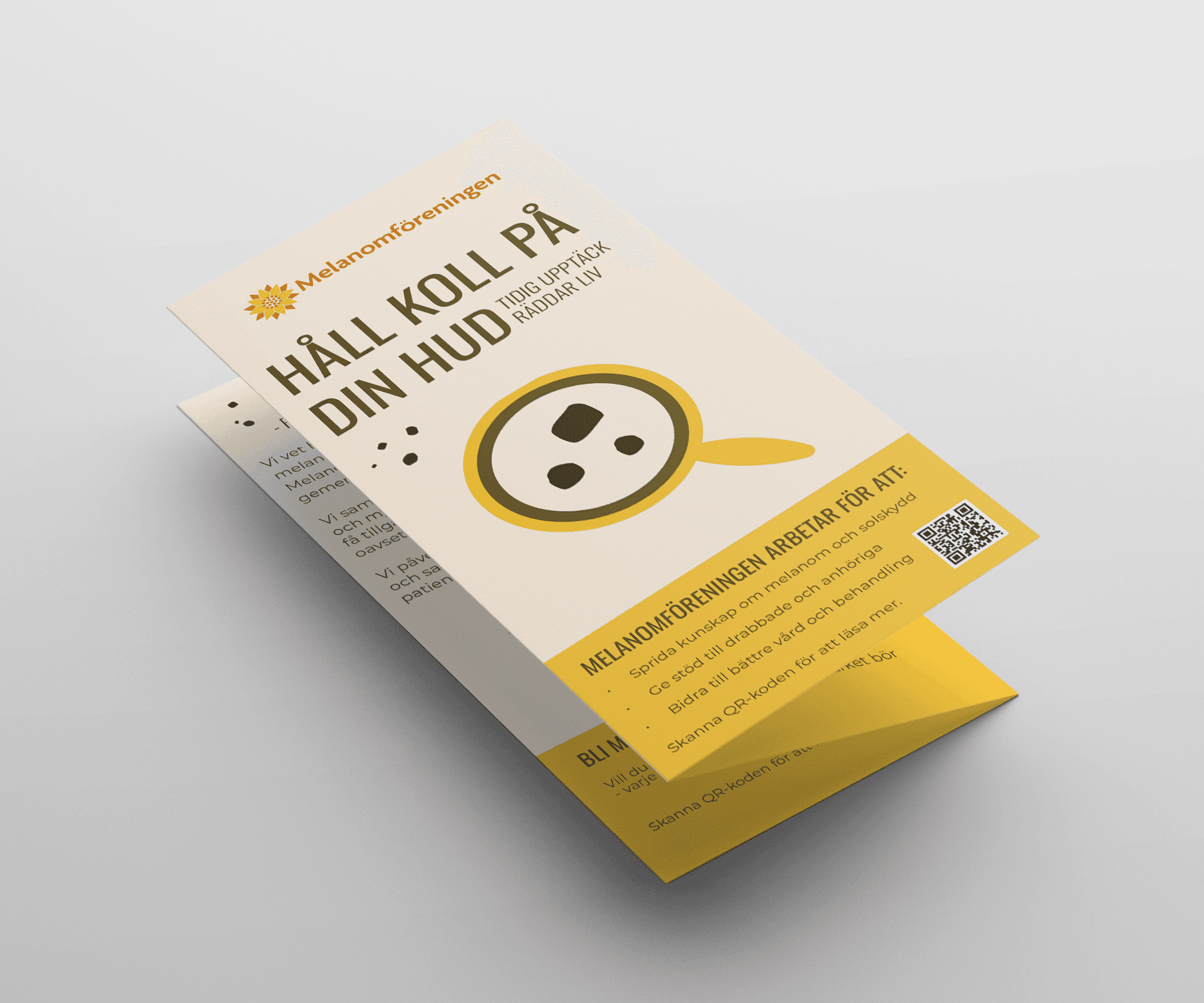 Mockup tri-folder Melanomföreningen