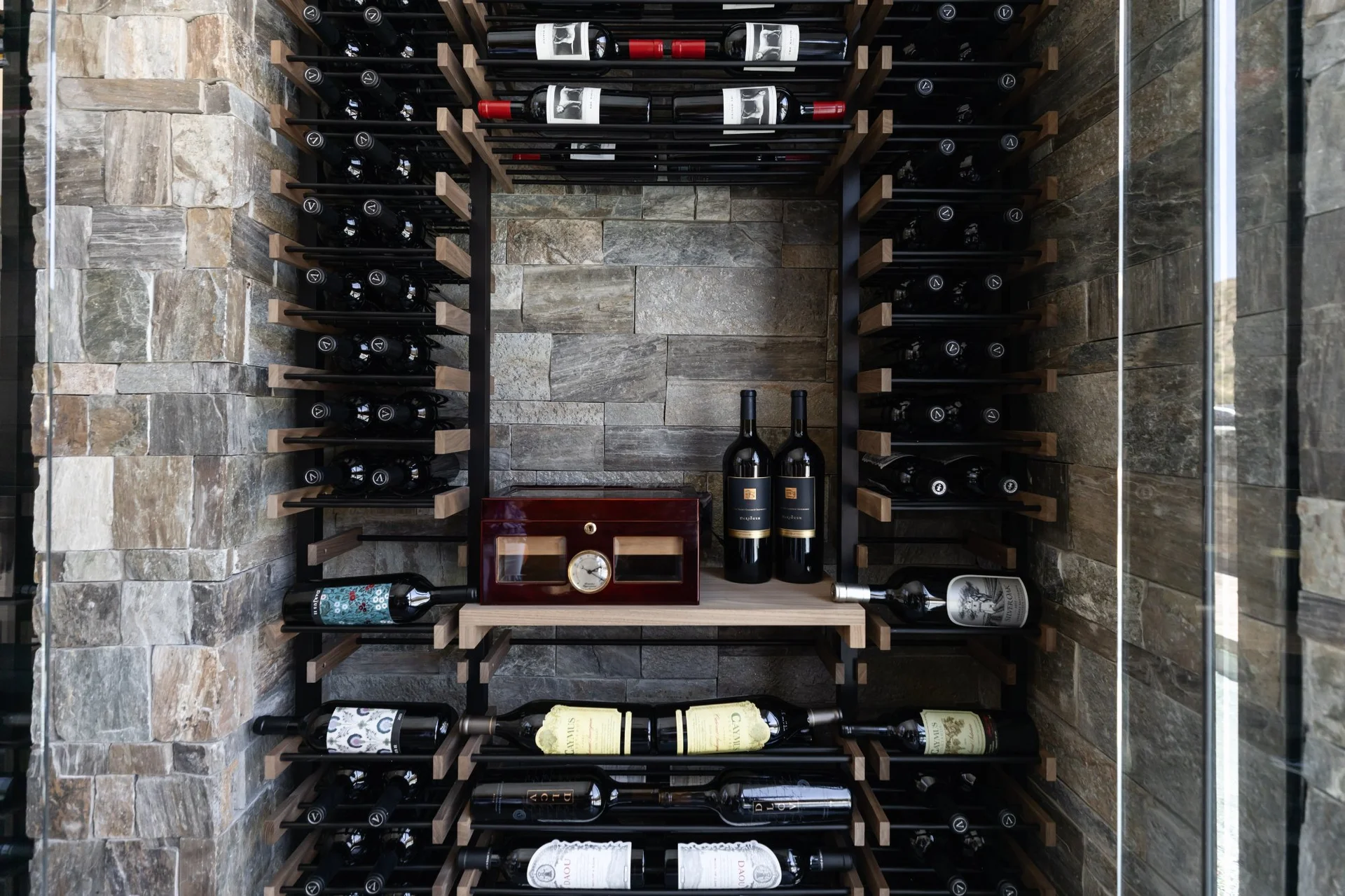 nfinity pool blending into the ocean view, minimalist sun loungers in soft neutral fabric, curved architecture