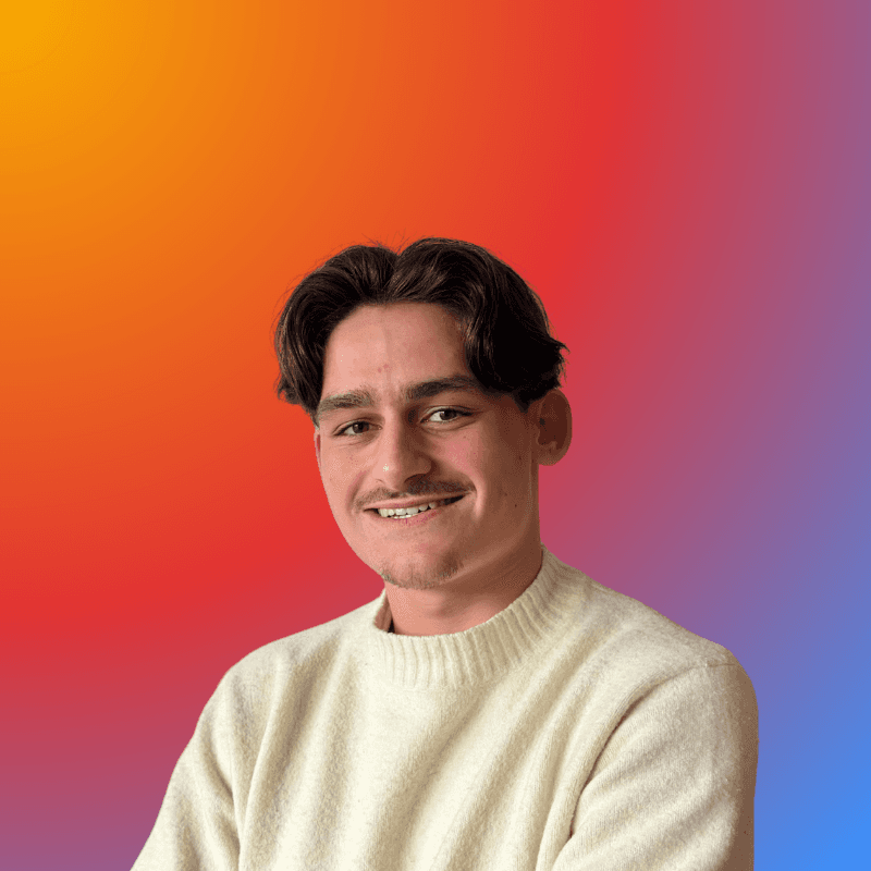 A cartoon character wearing a blue shirt and a blue hat