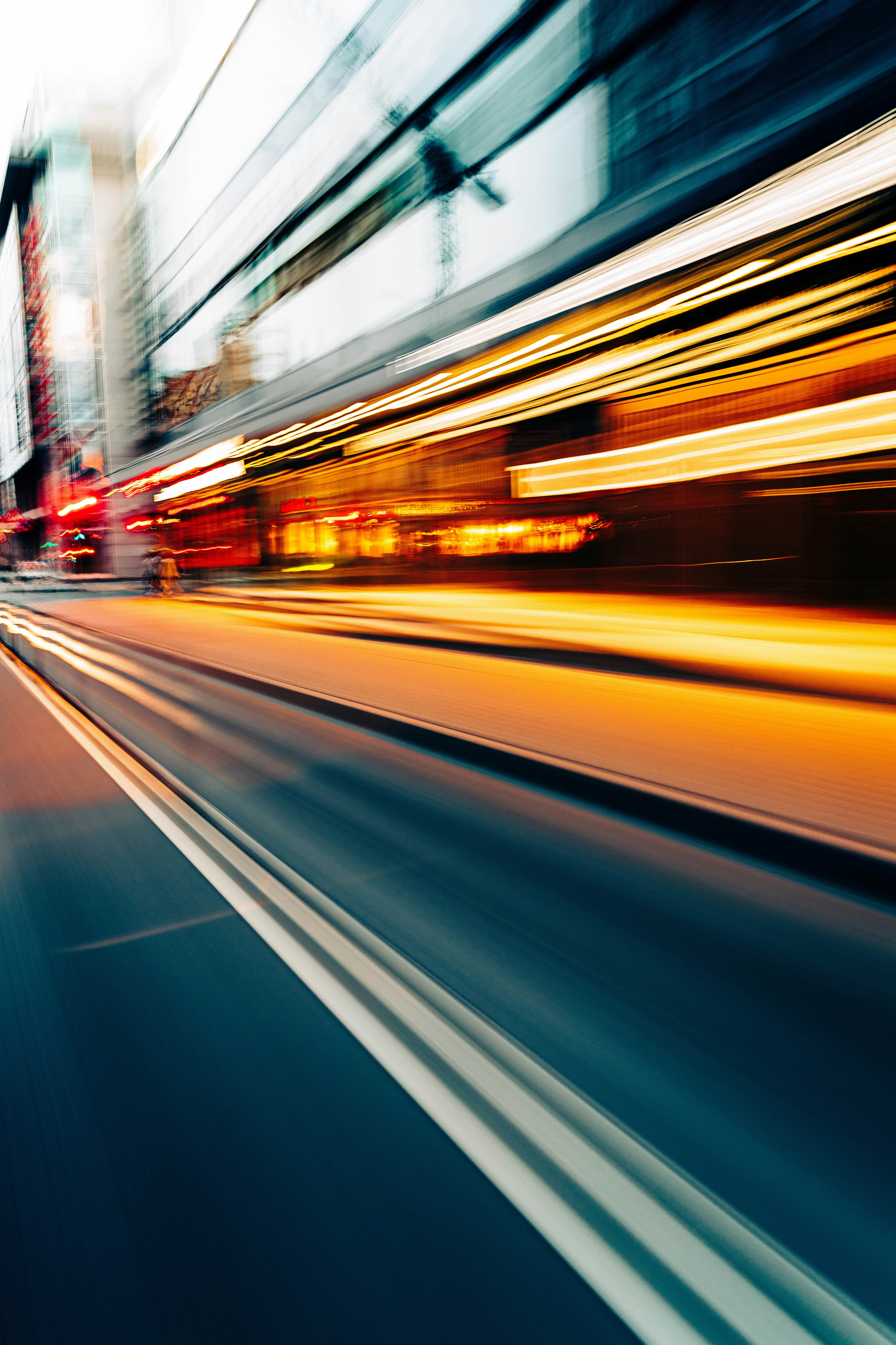 a blurry photo of a city street at night