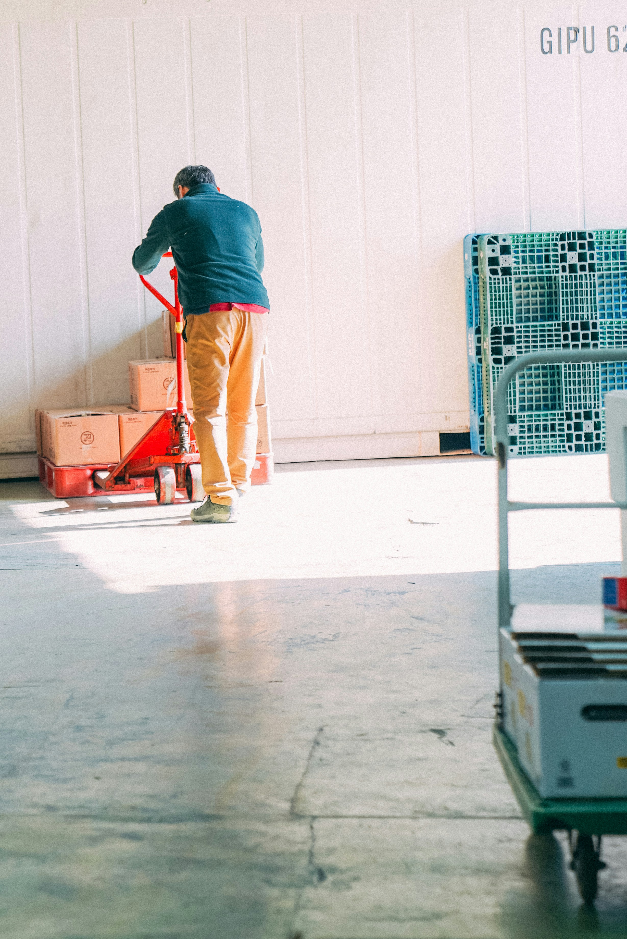 man moving boxes