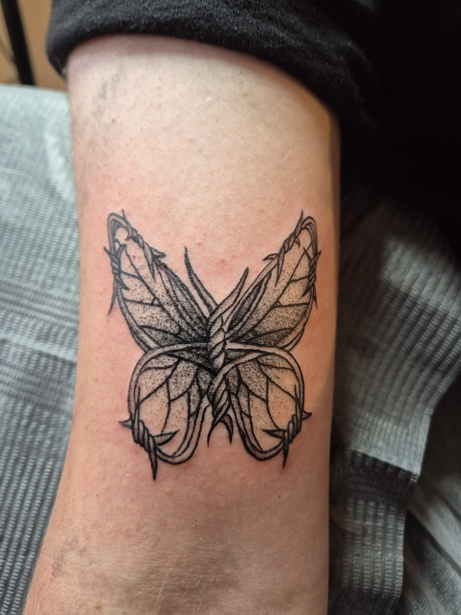 Arm tattoo of a pirate.