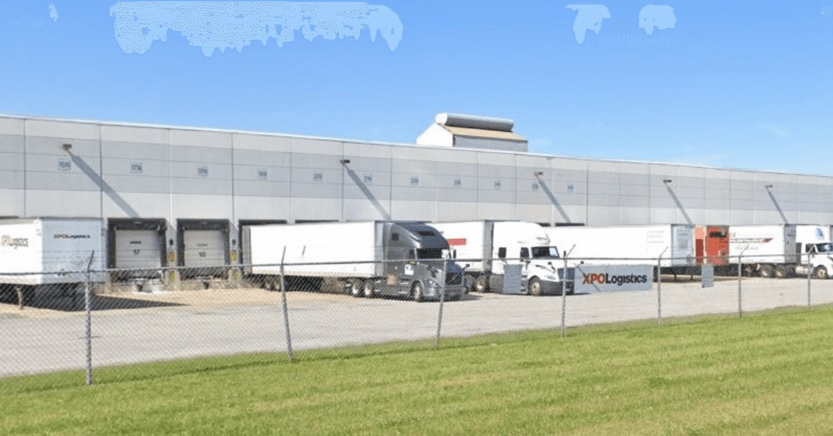 Exterior of a First Logistics warehouse facility used for multi-client 3PL operations and dock scheduling