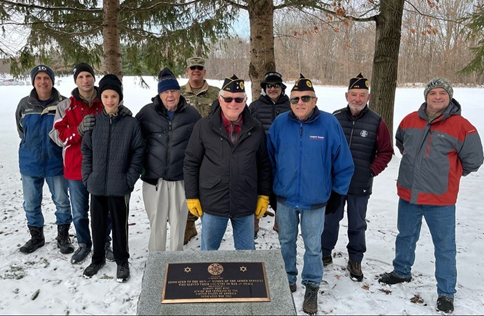Volunteers from the Jewish War Veterans gather for a memorial prayer before placing stones at the grave sites of Jewish personnel buried at the Gerald B.H. Solomon Saratoga National Cemetery in Schuylerville. From left, Ron Tremper, Shawn Tabankin, Ephren Tabankin, Karl Auerbach, Col. Jason Lefton, Post 105 Commander Fred Altman, Andy Brachfield, Post 106 Commander Gene Altman, Jack Gold and William Jaffe. Photo by Rich Goldenberg.