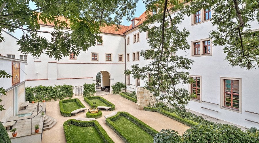A daylit photo of a courtyard at an Augustinian monastery in Prague