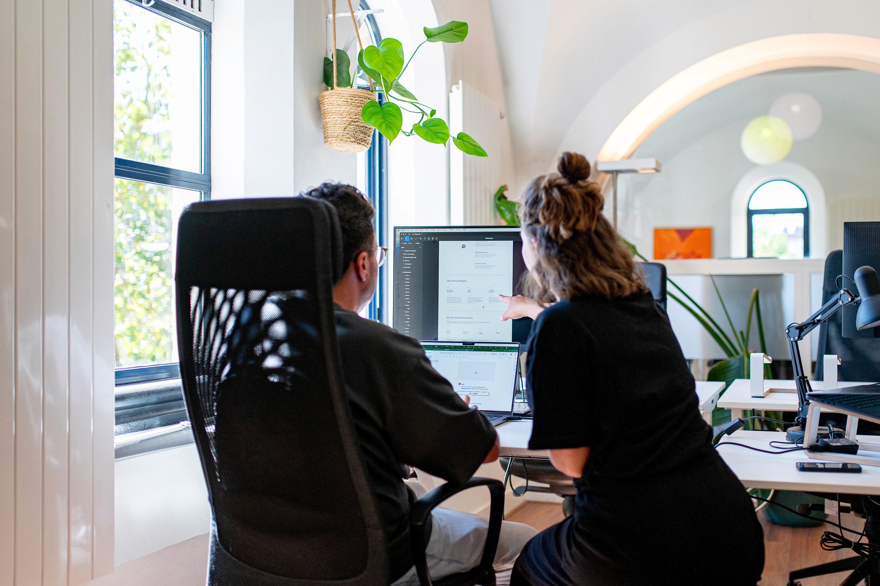 A photo of someone working at a computer