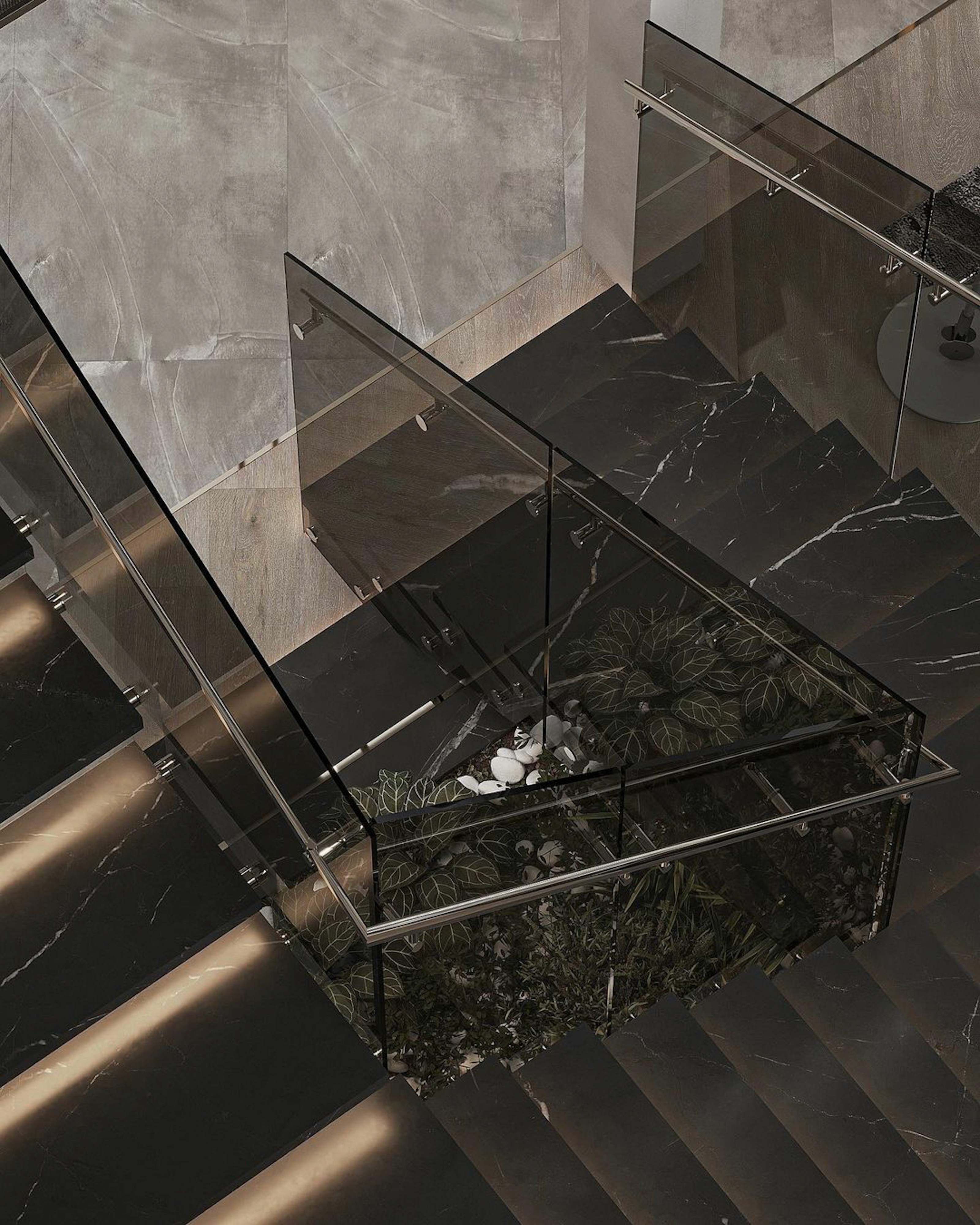Interior staircase with marble steps, a glass railing, and potted plants.
