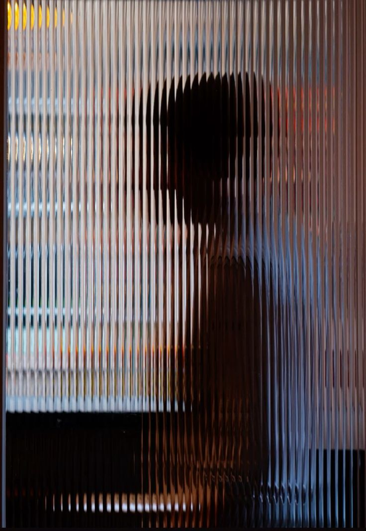 man in white and black checkered dress shirt